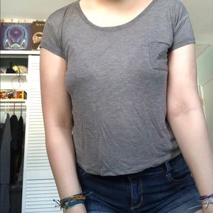 gray pocket tee with triangles on the back